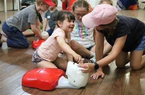 Kids learning first aid