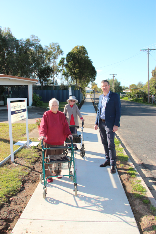 Betty Thompson and Shirley Eather pictured on the new Wilson Street footpath in Texas with Mayor of the Goondiwindi Region the Honourable Cr Lawrence Springborg AM on Tuesday photo courtesy of MacIntyre Gazette