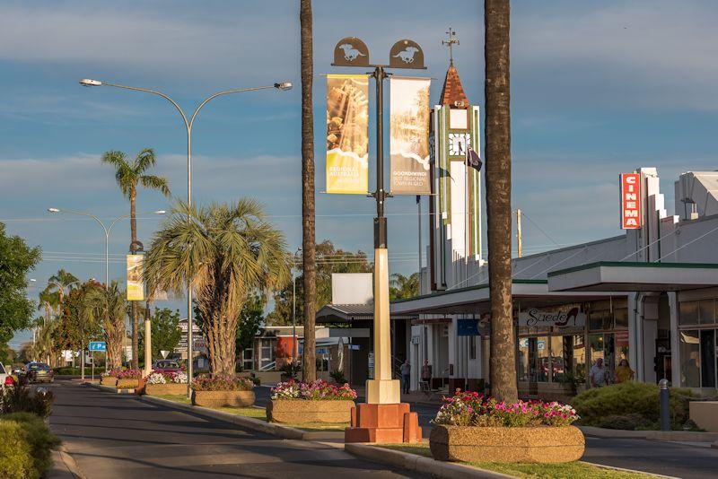 Goondiwindi main street featuring banners and palm trees