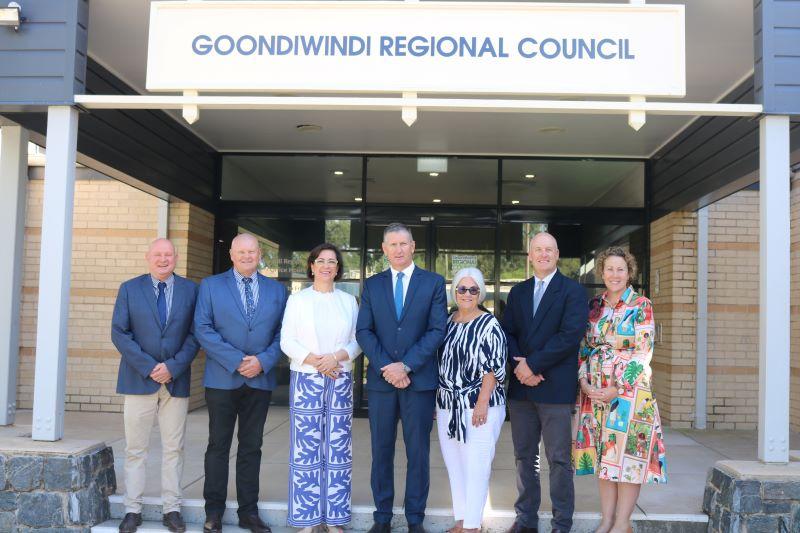 newly elected councillors standing on the steps with the Goondiwindi Regional Council sign above them